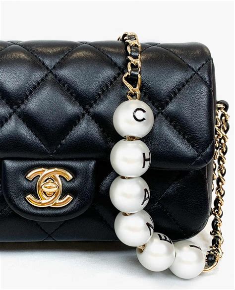 chanel pearl shaped bag|chanel bag with pearl chain.